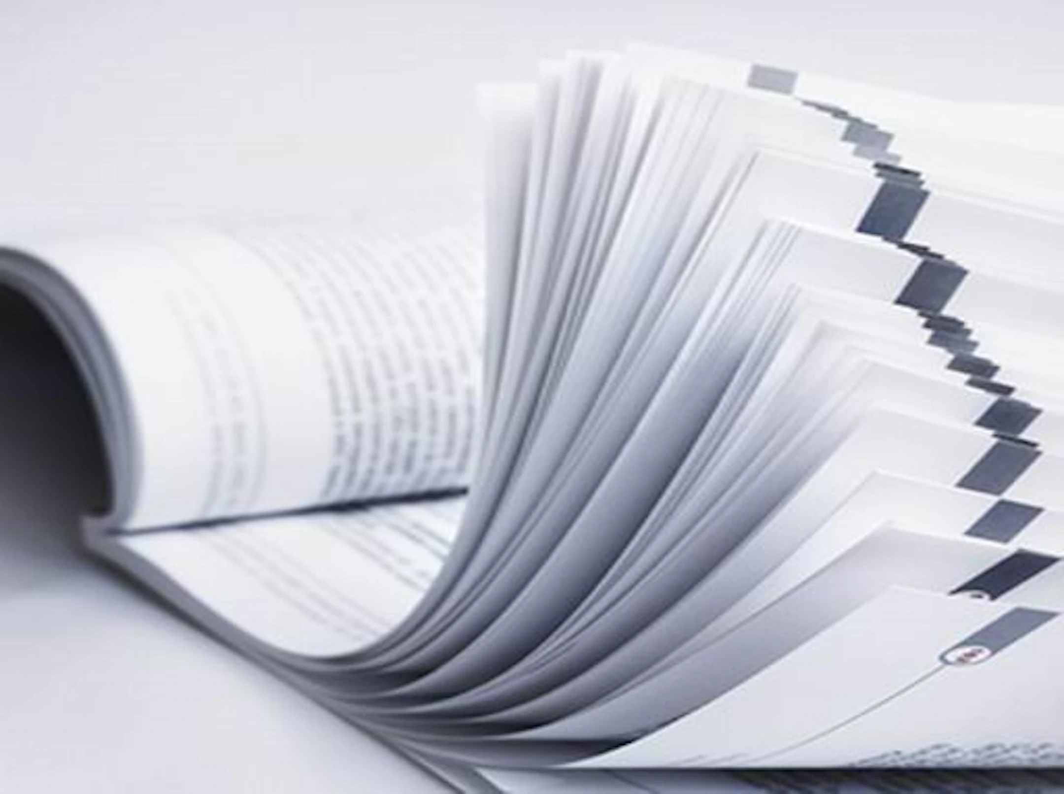 curled pages of a booklet