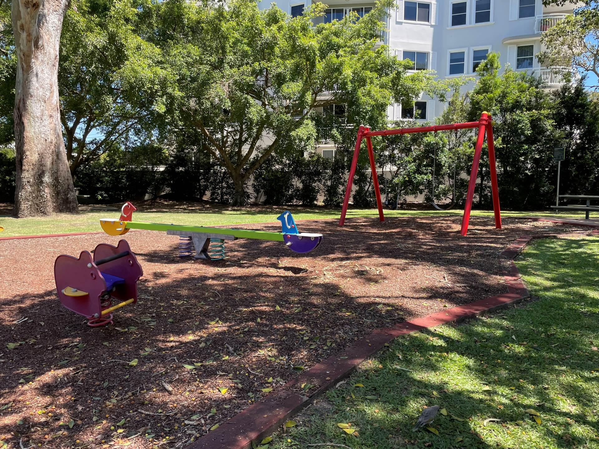 Playground with swings and play equipment