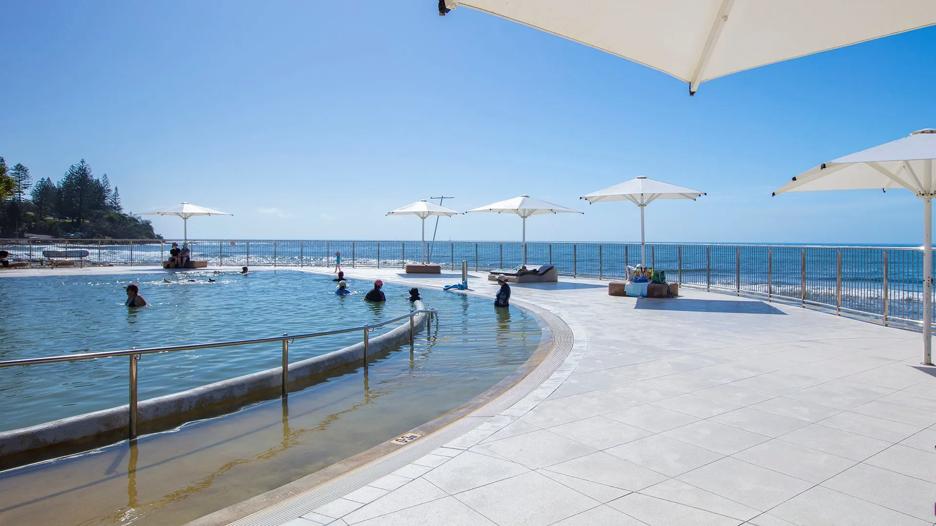 Kings Beach ocean pool with people swimming