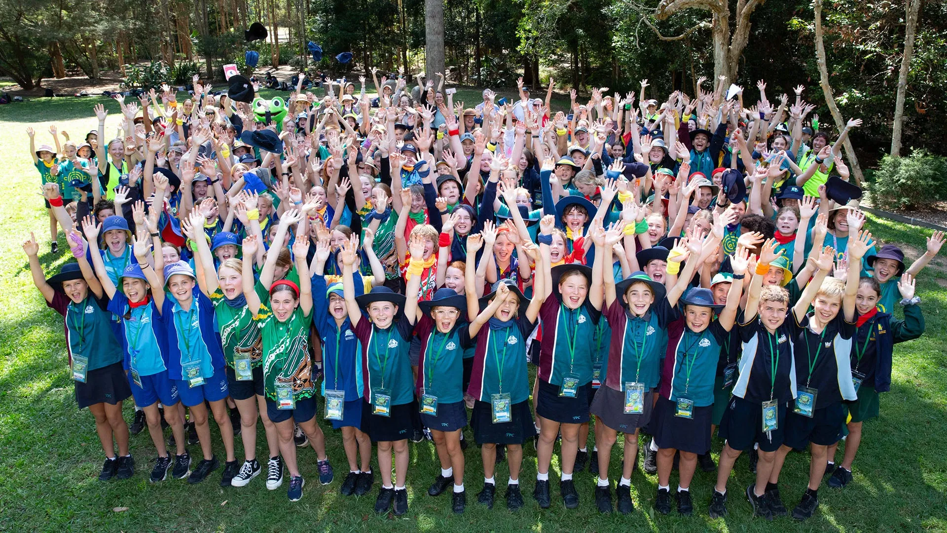 2023 participant group punching the air with joy