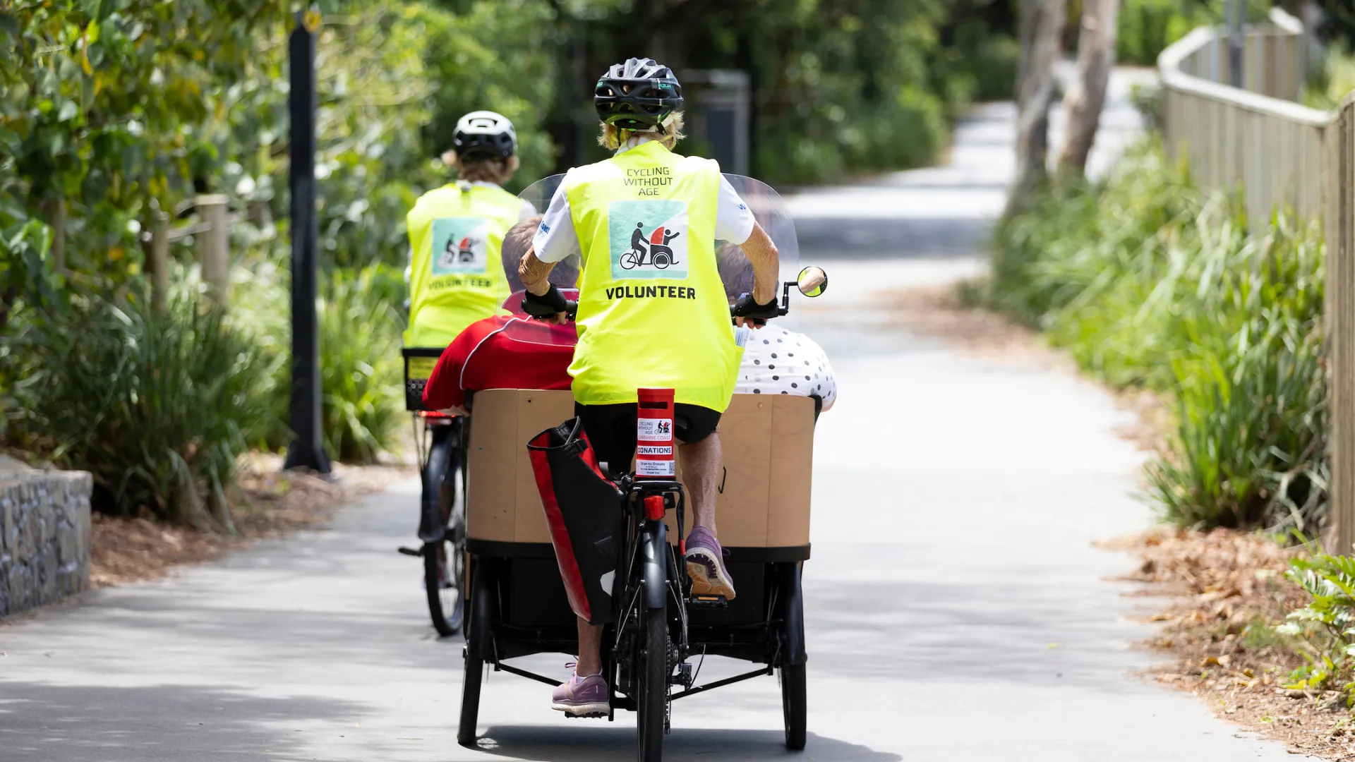 People riding bicycles