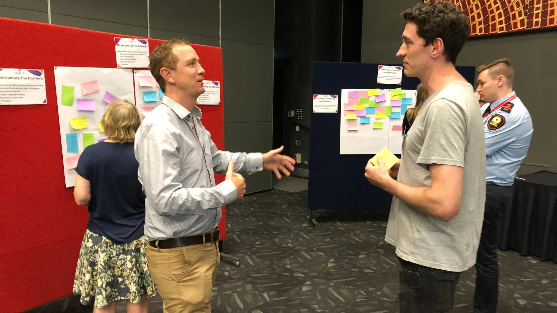 People talking at an event