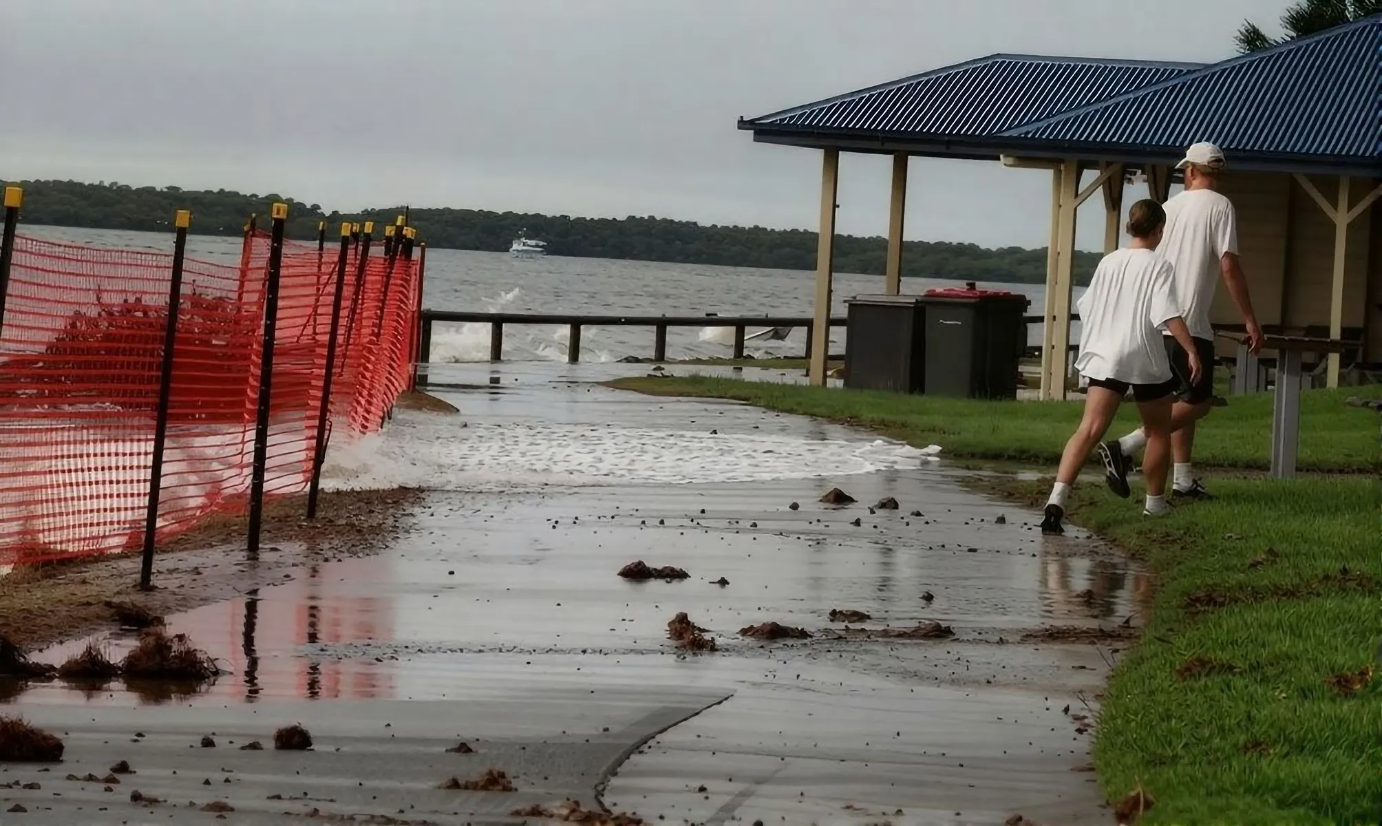 Golden Beach inundation over pathway.
