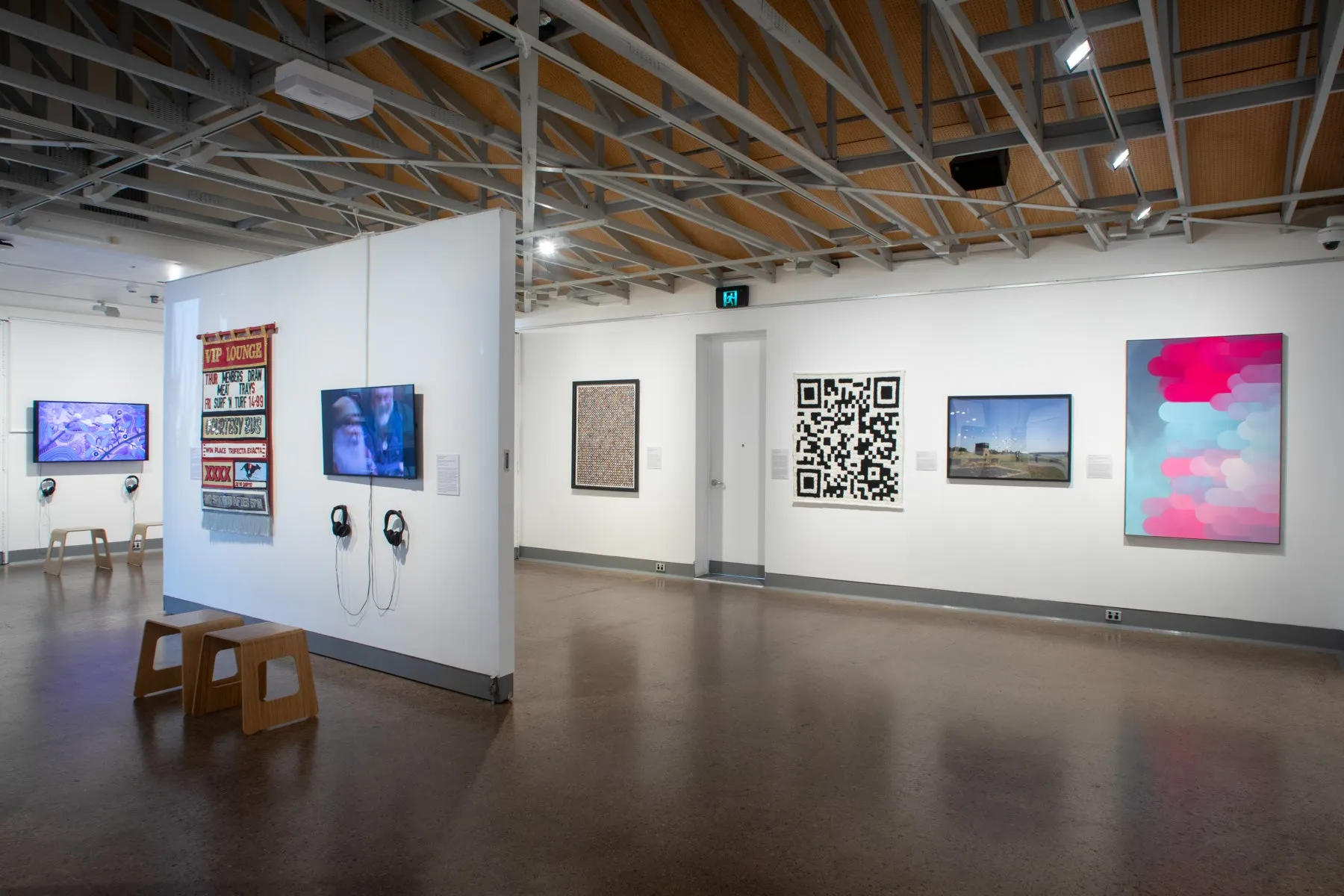 A number of Sunshine Coast National Art Prize artworks hanging on exhibition walls