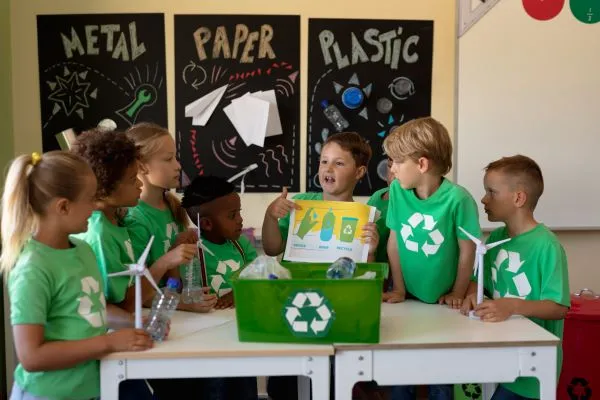 Students learning to recycle