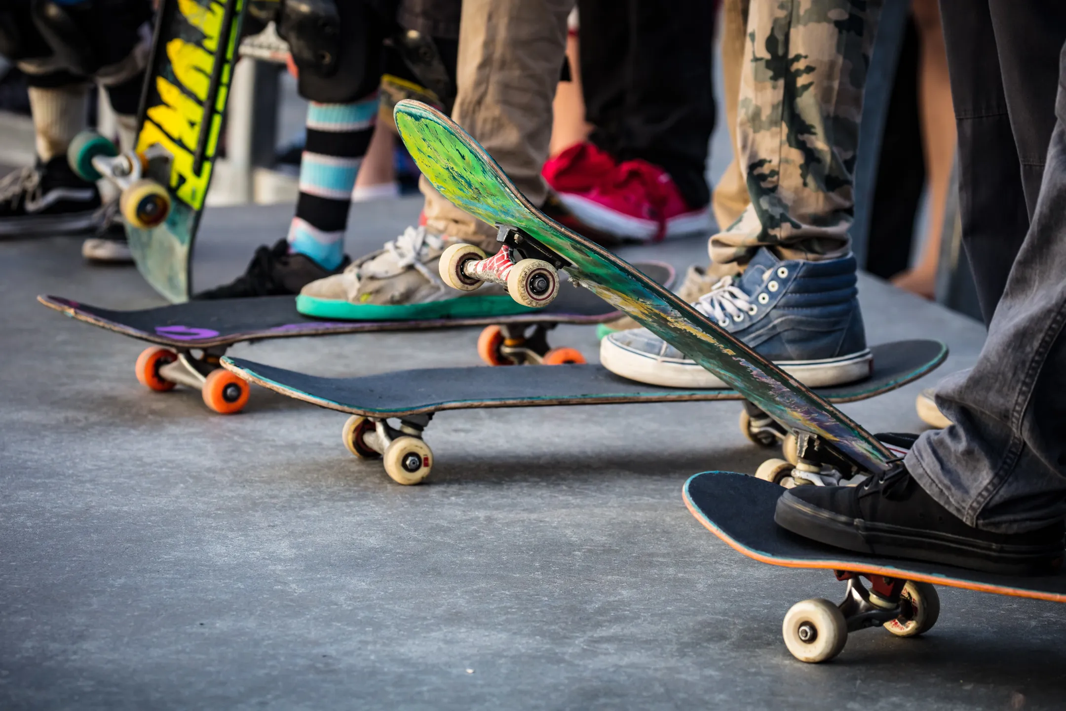 Skate boarders lined up.