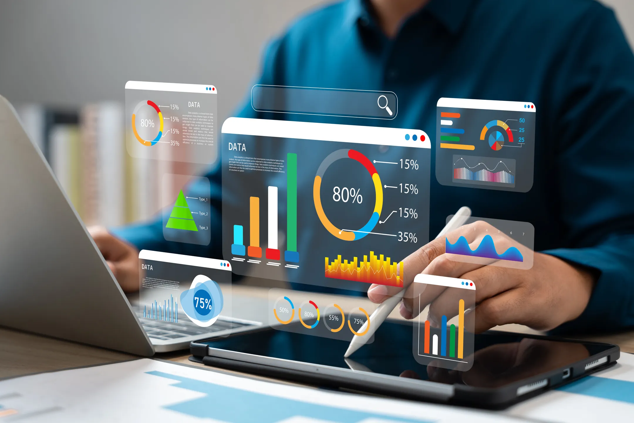 A person sitting at a laptop with images of data sitting above it