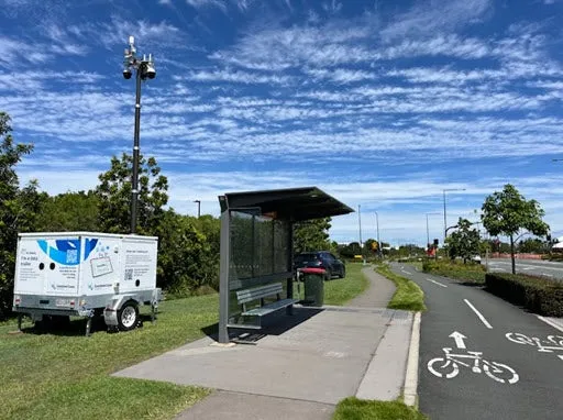 Data trailer deployed behind bus stop