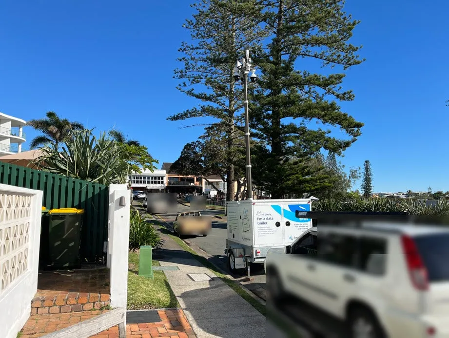 Data trailer parked on side of road
