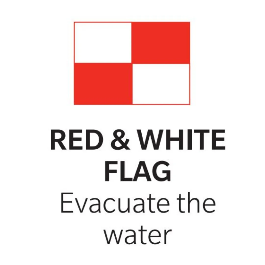 Red and white flag sign with Evacuate the water written on the sign.