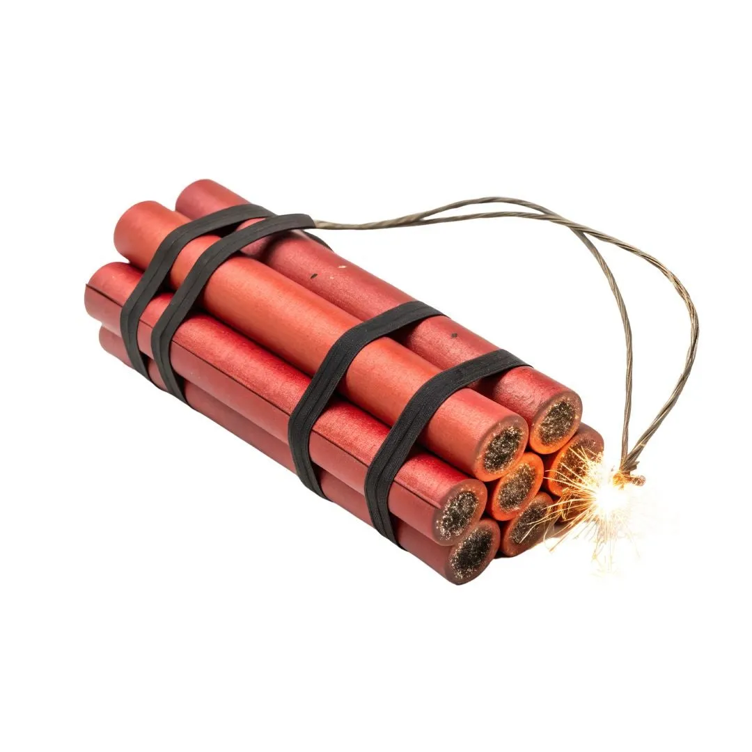 Bundle of dynamite sticks with lit fuse