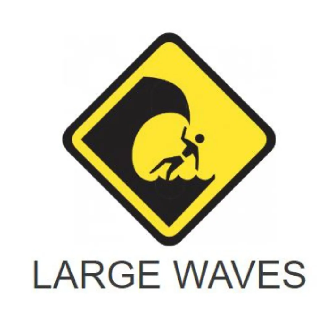 Black and yellow sign displaying a person surfing with the words Large waves written on the sign.