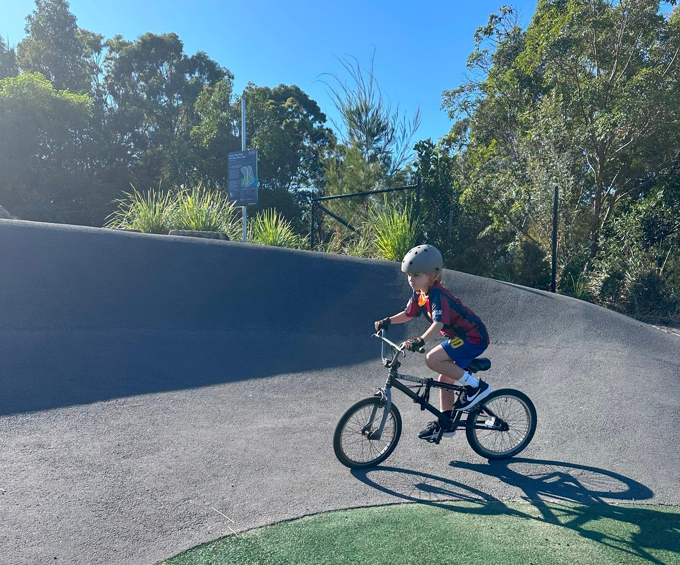 Rider on the pump track at Sugar Bag Road, Sunshine Coast