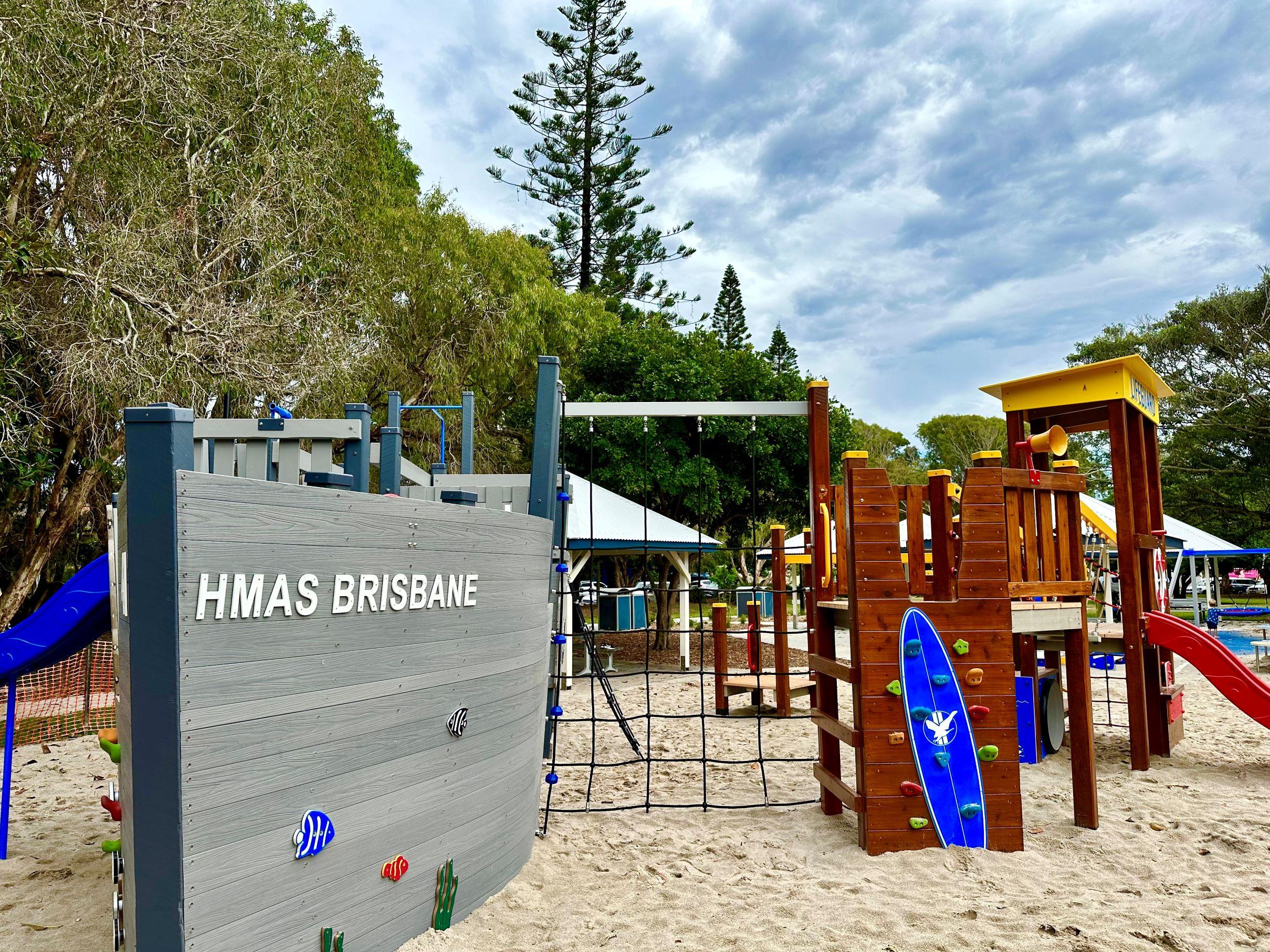 HMAS Brisbane and Lifeguard tower play structures at Power Memorial Park, Mudjimba