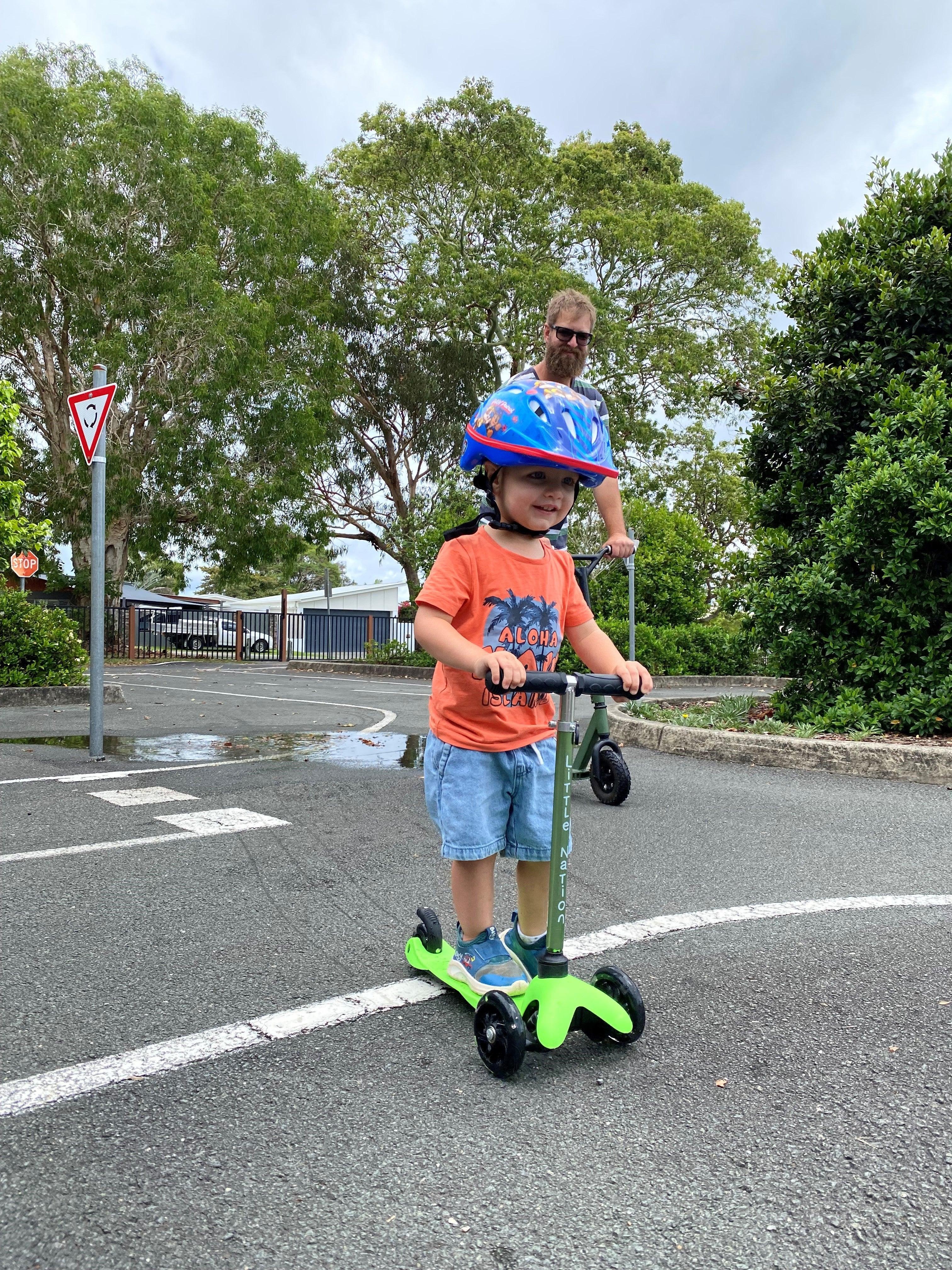 Young boy and scooter Grahame Stewart