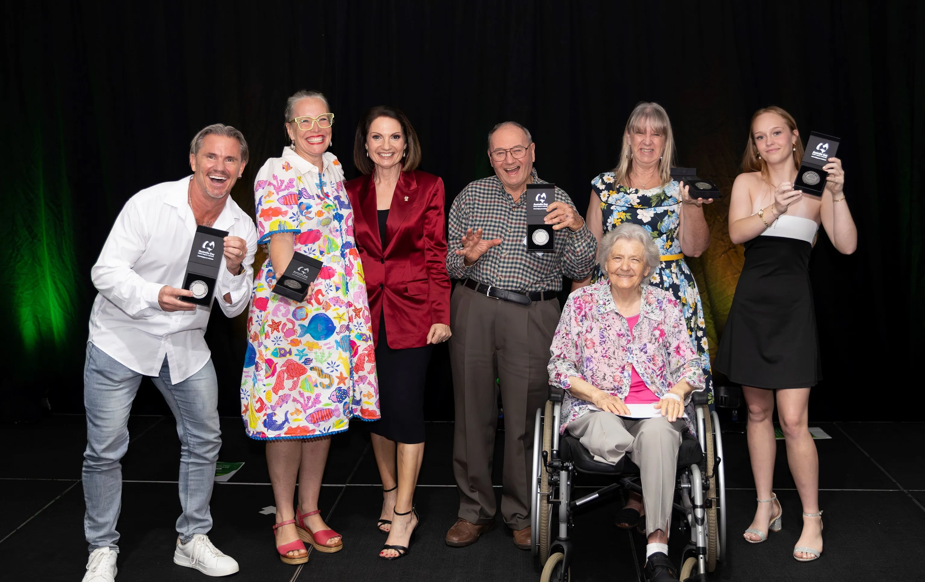 Award recipients celebrate with the Sunshine Coast Mayor.