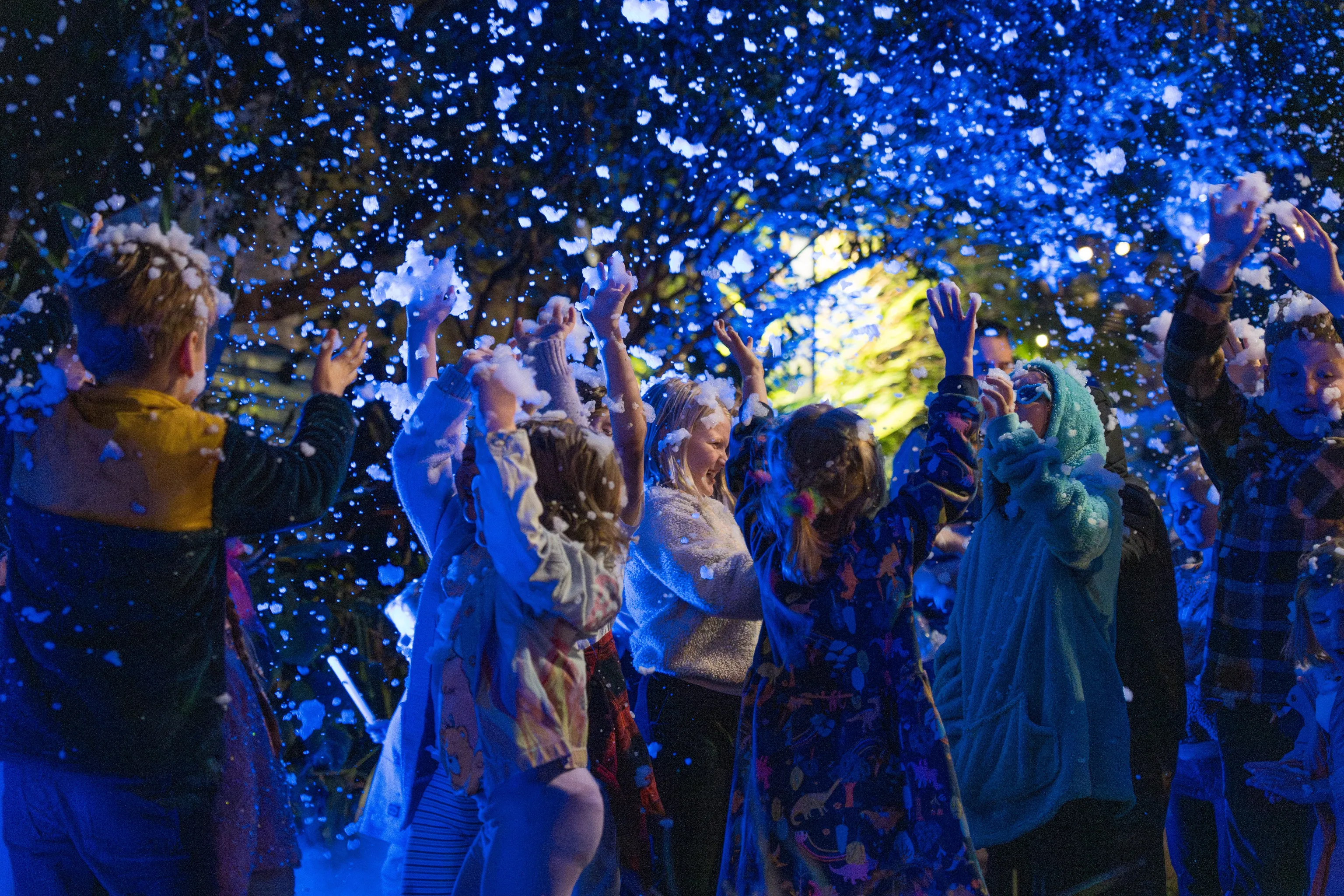 Kids playing with fake snow at Winter Wunderland 2024