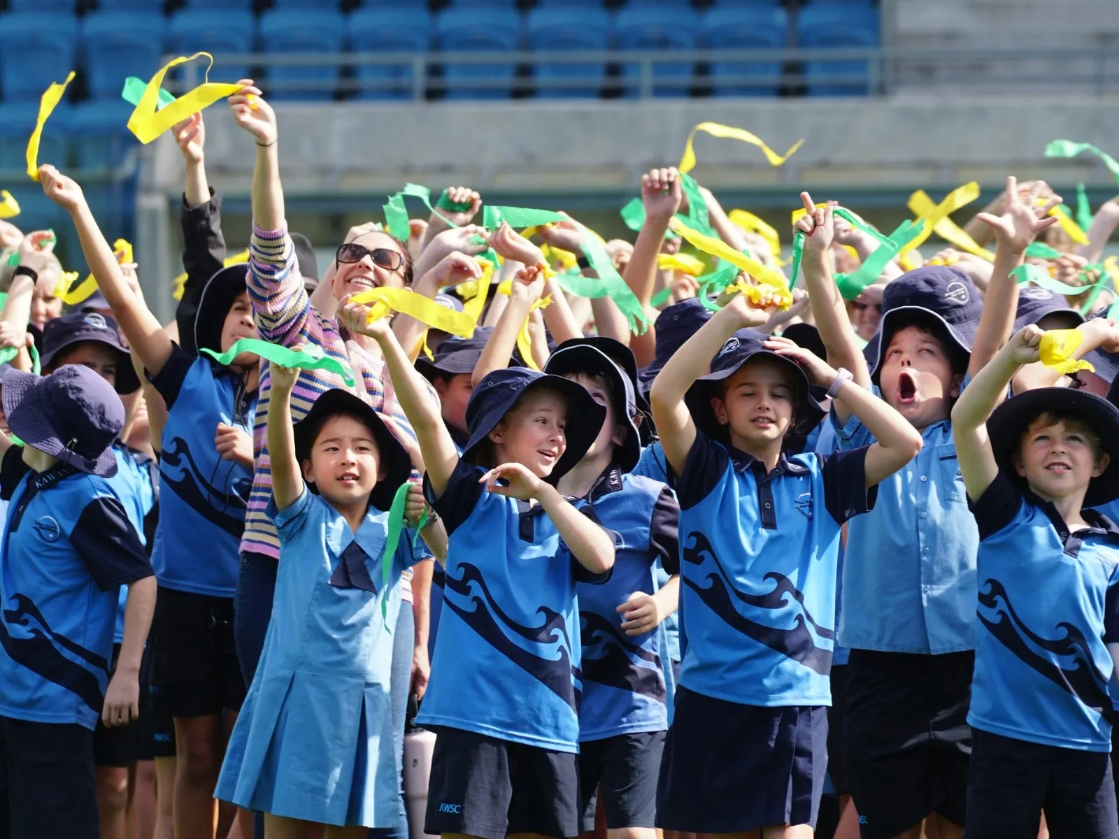 School students waving streamers in celebration of 6 years to go!