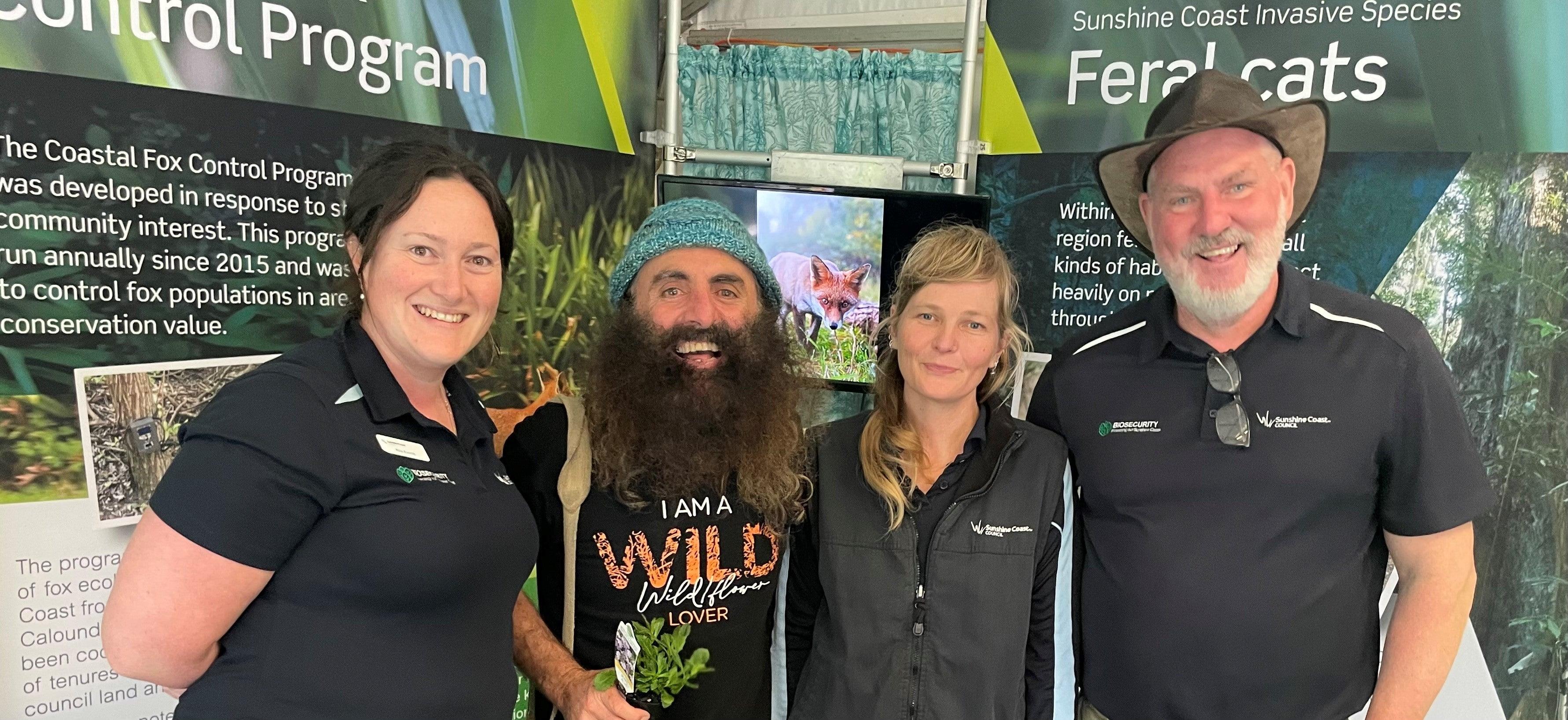 Education team with Costa inside a pop up booth.