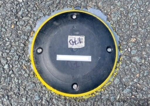 Parking sensor installed on road in Woombye