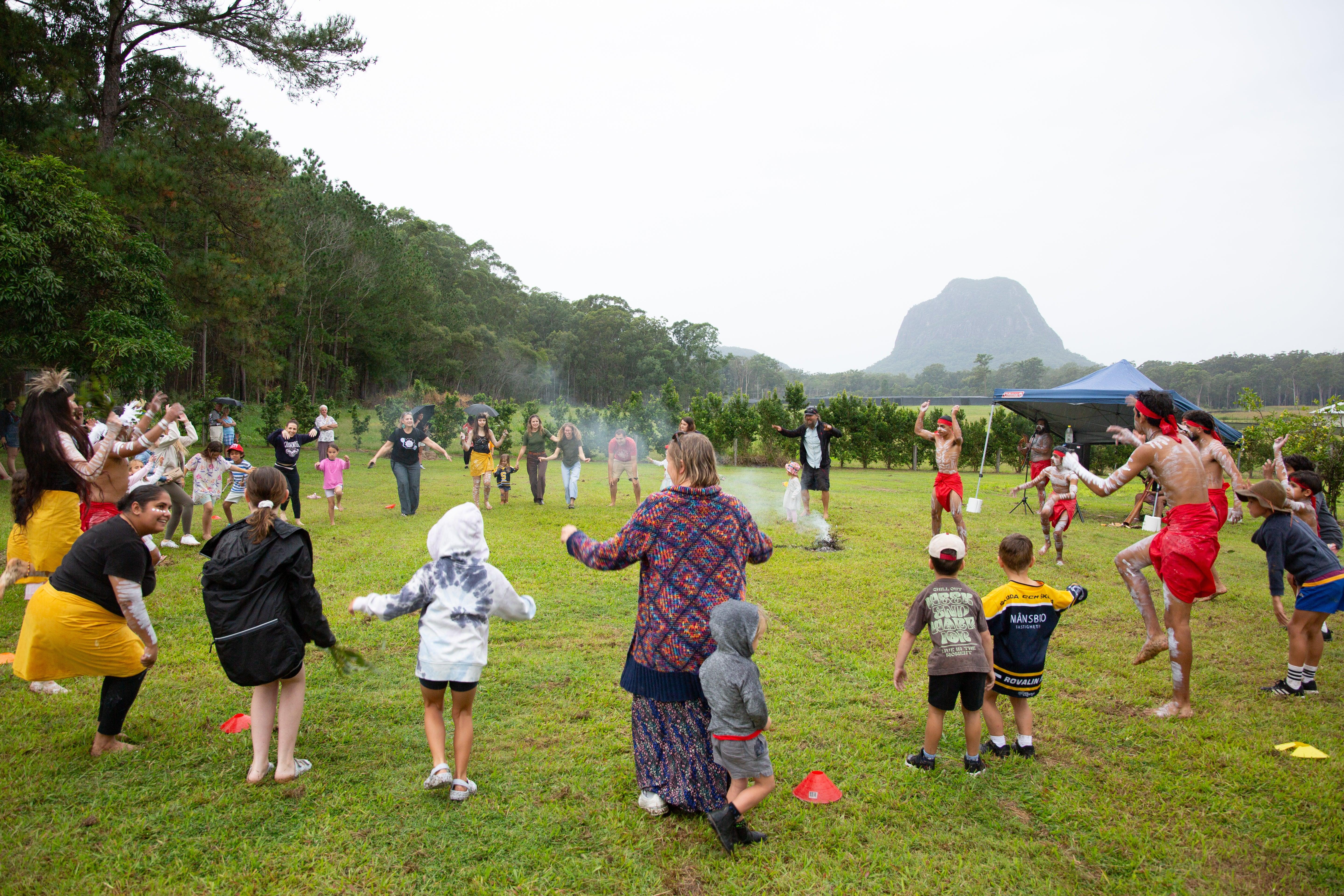 First Nations Family Fun Day at Bankfoot House - people dancing in the grounds
