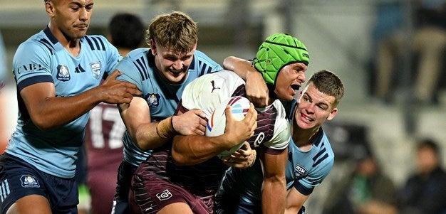 NRL Under 19s - 3 NSW origin players tackling a Qld player for the ball.