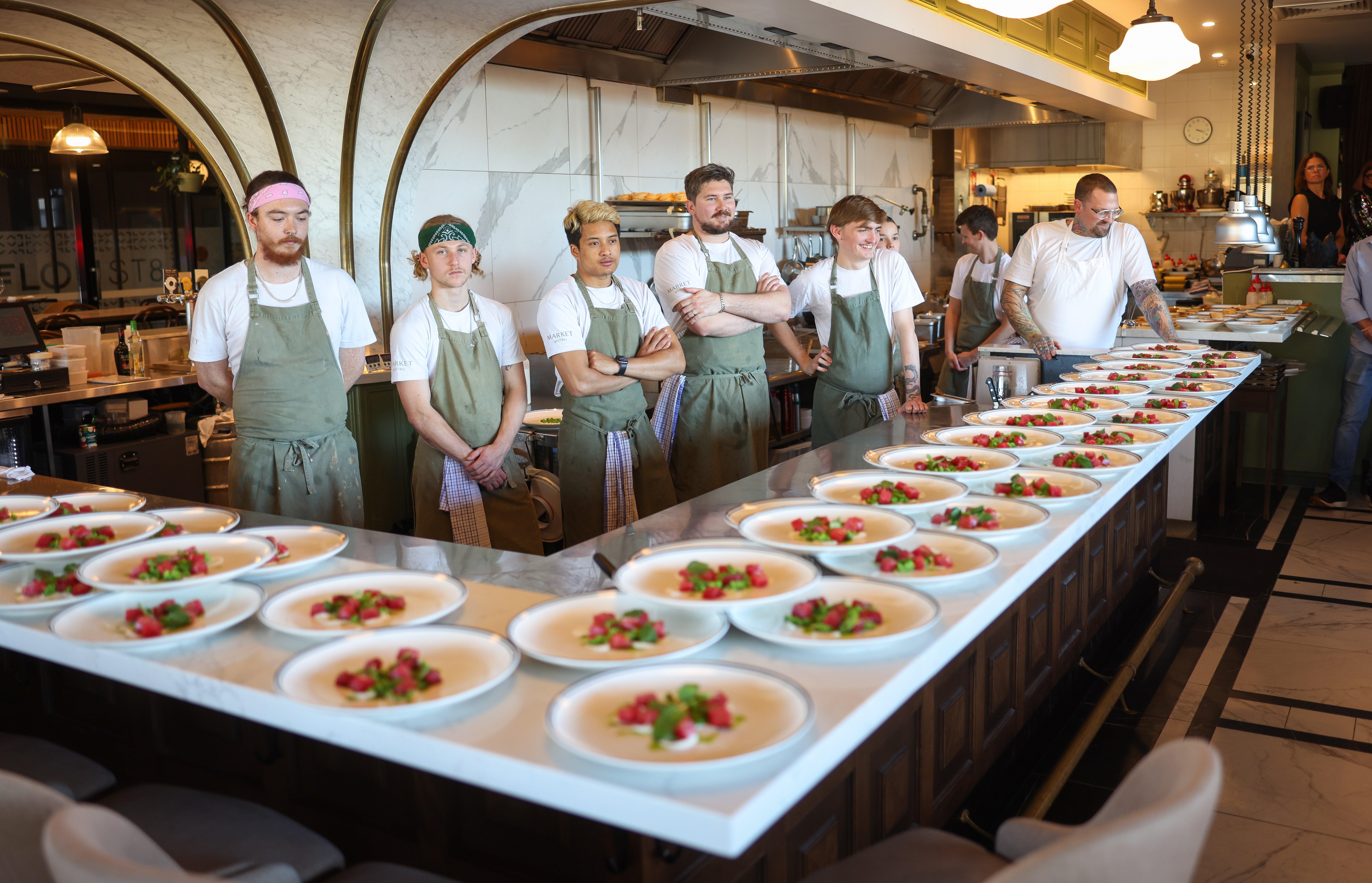 The Curated Plate - Market Bistro staff and plated food ready to serve